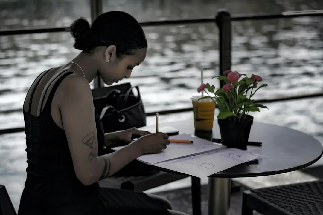serious woman writing notes